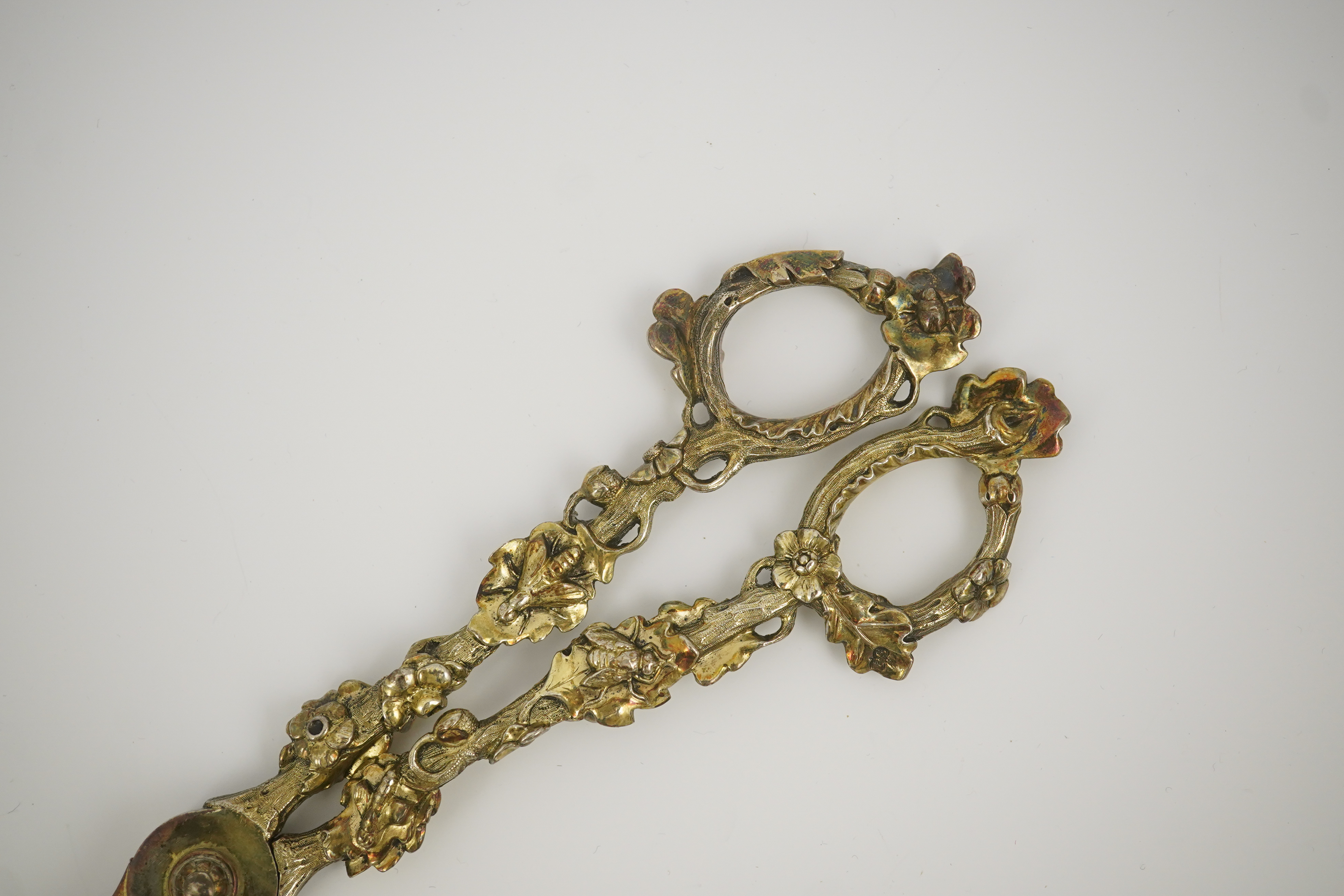 A cased pair of William IV Paul Storr silver gilt grape shears, in later case